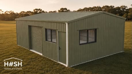 Pale eucalypt green gable shed with roller door and windows